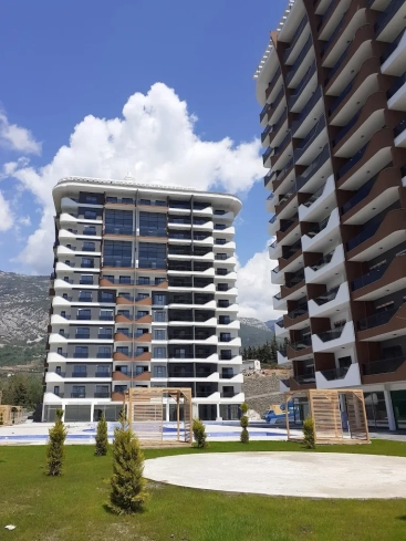 1+1 Apartment in Mahmutlar — New 2023 Residence, Furnished, Pools and €65,000 Price