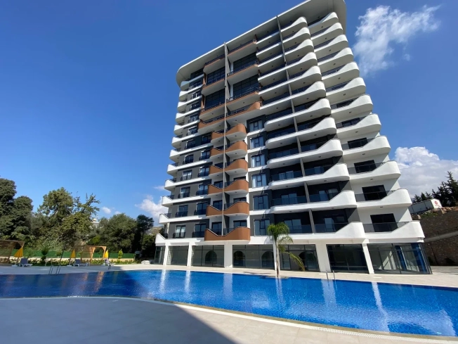1+1 Apartment in Mahmutlar — New 2023 Residence, Furnished, Pools and €65,000 Price