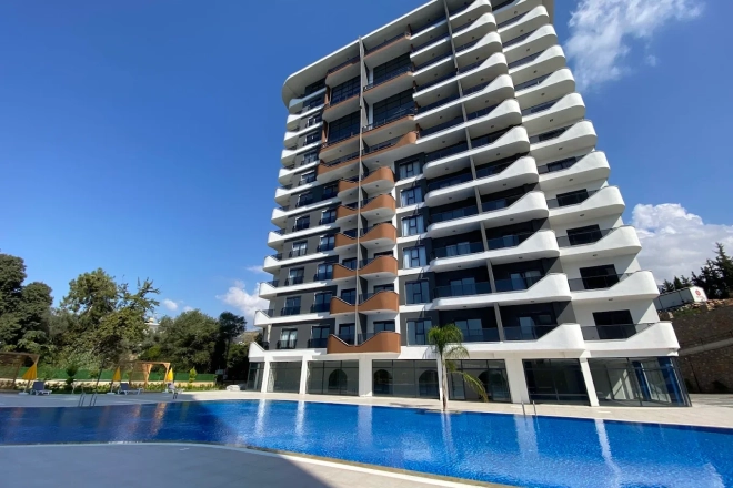 1+1 Apartment in Mahmutlar — New 2023 Residence, Furnished, Pools and €65,000 Price