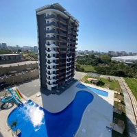 1+1 Apartment in Mahmutlar — New 2023 Residence, Furnished, Pools and €65,000 Price