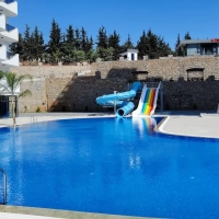 1+1 Apartment in Mahmutlar — New 2023 Residence, Furnished, Pools and €65,000 Price