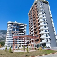 1+1 Apartment in Mahmutlar — New 2023 Residence, Furnished, Pools and €65,000 Price