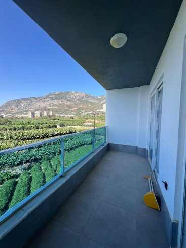 Buy a 1+1 Apartment in Mahmutlar, Alanya — Furnished Apartment with Open Mountain Views for €66,000