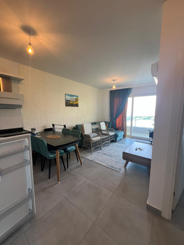 Buy a 1+1 Apartment in Mahmutlar, Alanya — Furnished Apartment with Open Mountain Views for €66,000