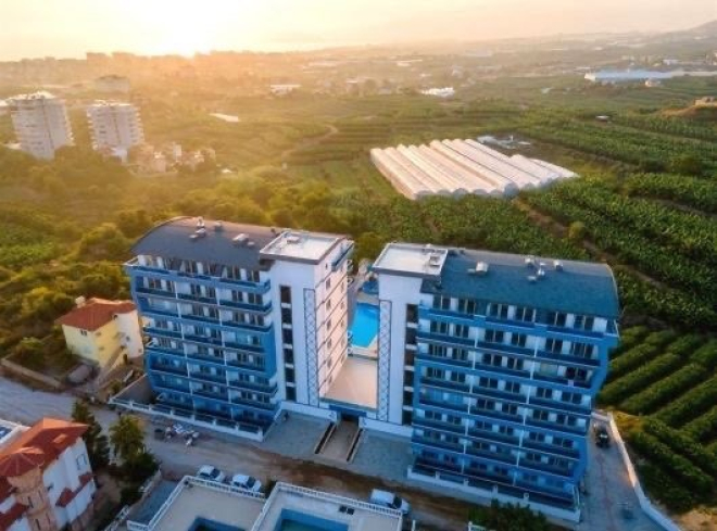Buy a 1+1 Apartment in Mahmutlar, Alanya — Furnished Apartment with Open Mountain Views for €66,000