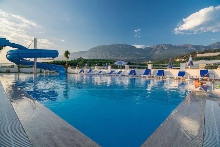 Buy a 1+1 Apartment in Mahmutlar, Alanya — Furnished Apartment with Open Mountain Views for €66,000