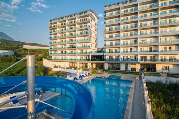 Buy a 1+1 Apartment in Mahmutlar, Alanya — Furnished Apartment with Open Mountain Views for €66,000