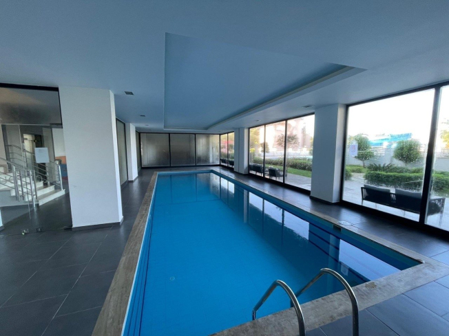 Buy a 1+1 Apartment in Mahmutlar, Alanya — Furnished Apartment with Open Mountain Views for €66,000