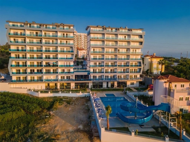 Buy a 1+1 Apartment in Mahmutlar, Alanya — Furnished Apartment with Open Mountain Views for €66,000