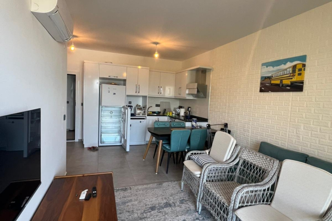 Buy a 1+1 Apartment in Mahmutlar, Alanya — Furnished Apartment with Open Mountain Views for €66,000