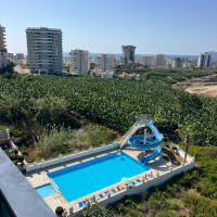 Buy a 1+1 Apartment in Mahmutlar, Alanya — Furnished Apartment with Open Mountain Views for €66,000