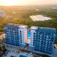 Buy a 1+1 Apartment in Mahmutlar, Alanya — Furnished Apartment with Open Mountain Views for €66,000