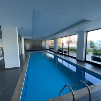 Buy a 1+1 Apartment in Mahmutlar, Alanya — Furnished Apartment with Open Mountain Views for €66,000