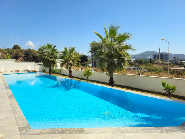 Buy a 1+1 Apartment in Mahmutlar, Alanya — New Furnished Apartment of 55 m² for €68,000