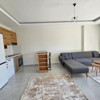 Buy a 1+1 Apartment in Mahmutlar, Alanya — New Furnished Apartment of 55 m² for €68,000