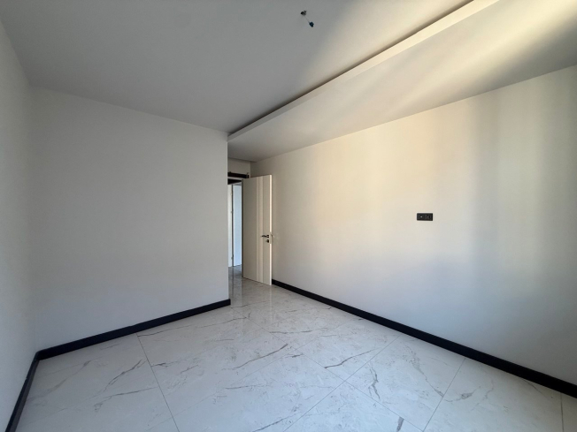 Buy a 2+1 Apartment in Mahmutlar, Alanya — New 110 m² Apartment with Sea and Mountain Views for €162,000