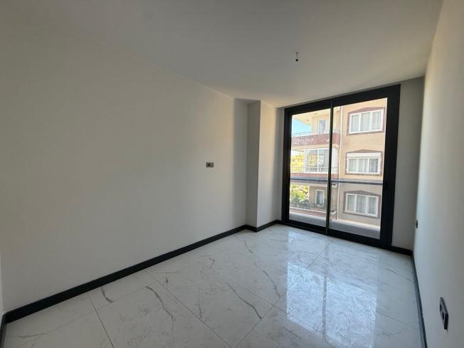 Buy a 2+1 Apartment in Mahmutlar, Alanya — New 110 m² Apartment with Sea and Mountain Views for €162,000
