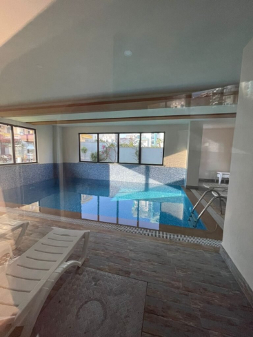 Buy a 1+1 Apartment in Mahmutlar, Alanya — Furnished 50 m² Apartment in Family Garden for €82,000