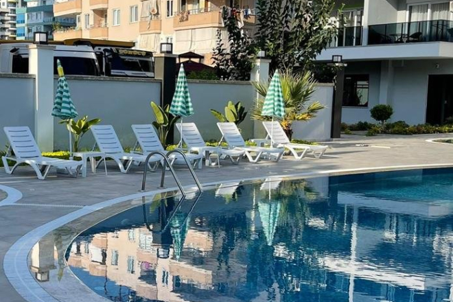 Buy a 1+1 Apartment in Mahmutlar, Alanya — Furnished 50 m² Apartment in Family Garden for €82,000