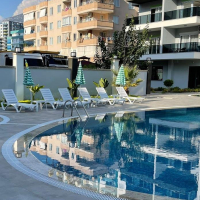 Buy a 1+1 Apartment in Mahmutlar, Alanya — Furnished 50 m² Apartment in Family Garden for €82,000