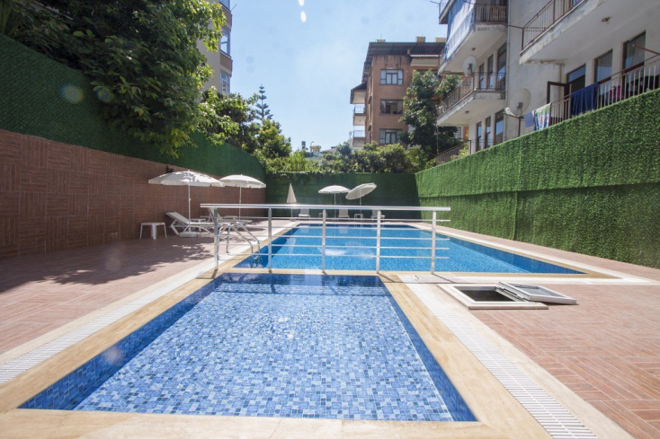 Buy a 1+1 Apartment in Central Alanya — Furnished 55 m² Apartment with Pool for €97,000