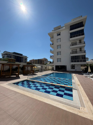 Buy a 1+1 Apartment in Kargicak, Alanya — Furnished 60 m² Sea-View Apartment 200 m from the Beach for €80,000