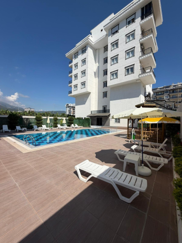 Buy a 1+1 Apartment in Kargicak, Alanya — Furnished 60 m² Sea-View Apartment 200 m from the Beach for €80,000