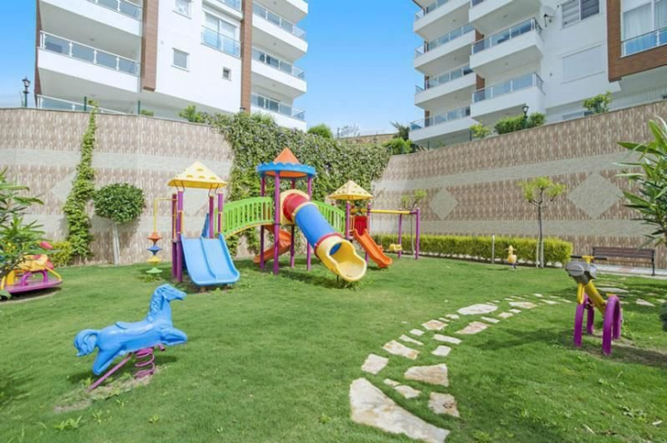 Buy a 2+1 Apartment in Kargicak, Alanya — Furnished 100 m² Apartment with Sea View, Pools and Beach Shuttle for €127,000