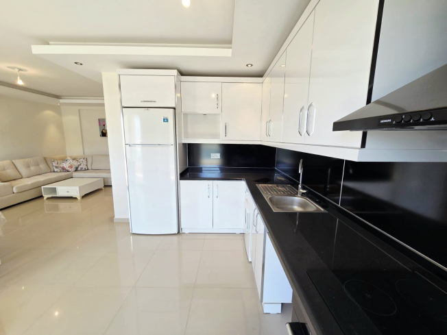 Buy a 2+1 Apartment in Kargicak, Alanya — Furnished 100 m² Apartment with Sea View, Pools and Beach Shuttle for €127,000