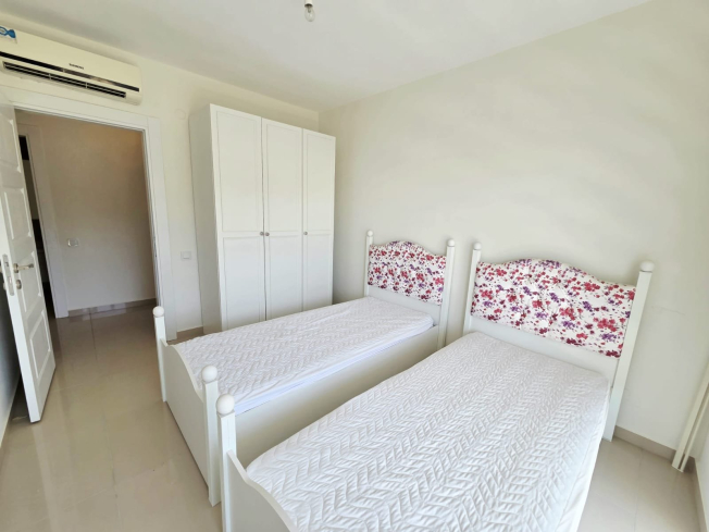 Buy a 2+1 Apartment in Kargicak, Alanya — Furnished 100 m² Apartment with Sea View, Pools and Beach Shuttle for €127,000