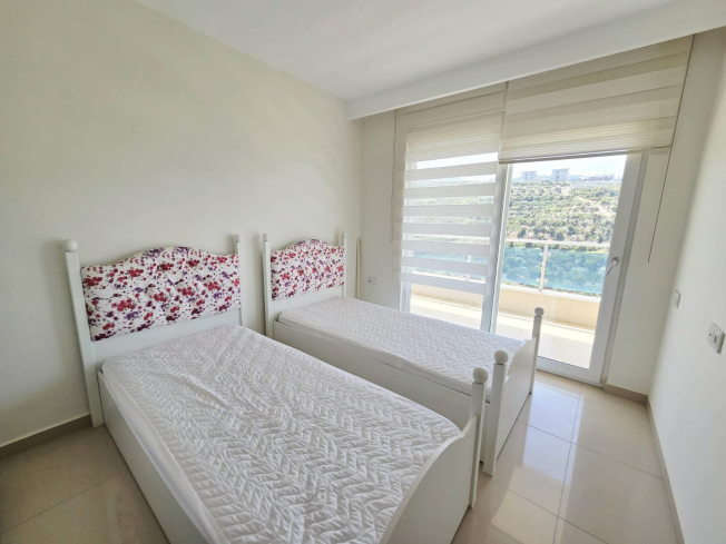Buy a 2+1 Apartment in Kargicak, Alanya — Furnished 100 m² Apartment with Sea View, Pools and Beach Shuttle for €127,000
