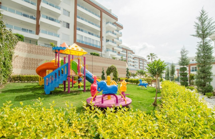 Buy a 2+1 Apartment in Kargicak, Alanya — Furnished 100 m² Apartment with Sea View, Pools and Beach Shuttle for €127,000