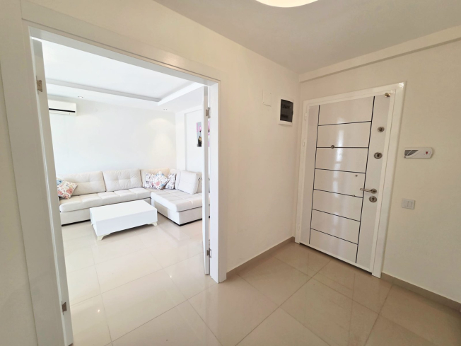 Buy a 2+1 Apartment in Kargicak, Alanya — Furnished 100 m² Apartment with Sea View, Pools and Beach Shuttle for €127,000