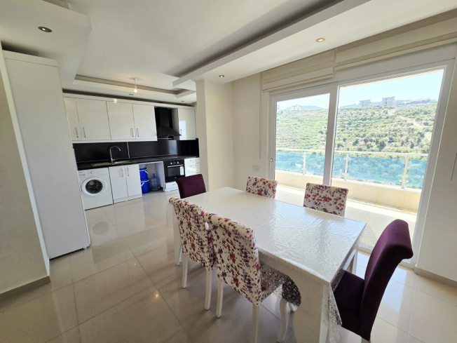 Buy a 2+1 Apartment in Kargicak, Alanya — Furnished 100 m² Apartment with Sea View, Pools and Beach Shuttle for €127,000