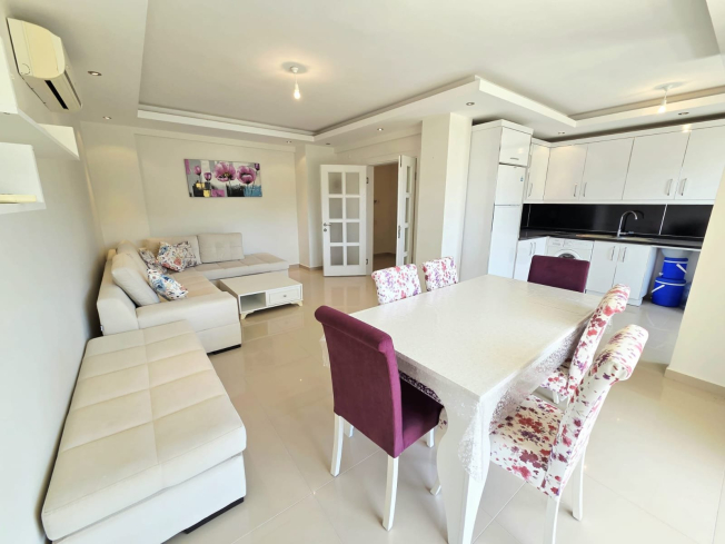 Buy a 2+1 Apartment in Kargicak, Alanya — Furnished 100 m² Apartment with Sea View, Pools and Beach Shuttle for €127,000