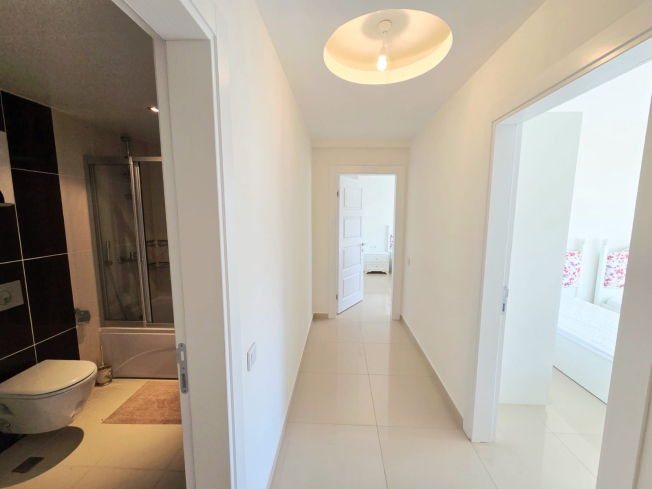 Buy a 2+1 Apartment in Kargicak, Alanya — Furnished 100 m² Apartment with Sea View, Pools and Beach Shuttle for €127,000