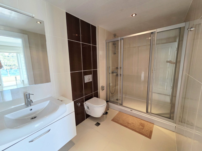 Buy a 2+1 Apartment in Kargicak, Alanya — Furnished 100 m² Apartment with Sea View, Pools and Beach Shuttle for €127,000