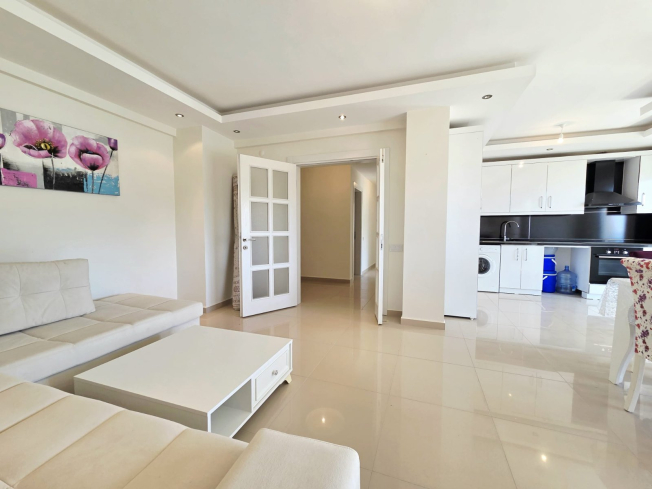 Buy a 2+1 Apartment in Kargicak, Alanya — Furnished 100 m² Apartment with Sea View, Pools and Beach Shuttle for €127,000