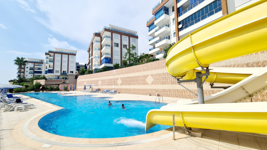 Buy a 2+1 Apartment in Kargicak, Alanya — Furnished 100 m² Apartment with Sea View, Pools and Beach Shuttle for €127,000