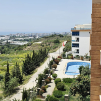 Buy a 2+1 Apartment in Kargicak, Alanya — Furnished 100 m² Apartment with Sea View, Pools and Beach Shuttle for €127,000