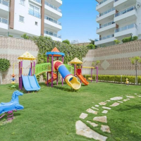 Buy a 2+1 Apartment in Kargicak, Alanya — Furnished 100 m² Apartment with Sea View, Pools and Beach Shuttle for €127,000