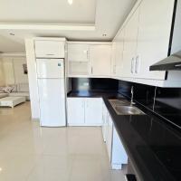 Buy a 2+1 Apartment in Kargicak, Alanya — Furnished 100 m² Apartment with Sea View, Pools and Beach Shuttle for €127,000