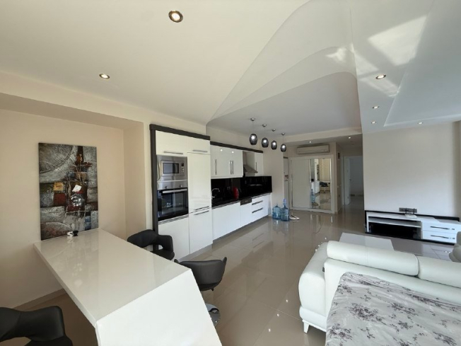 Buy a Furnished 2+1 Apartment with Panoramic Sea Views in Kargicak — 110 m²