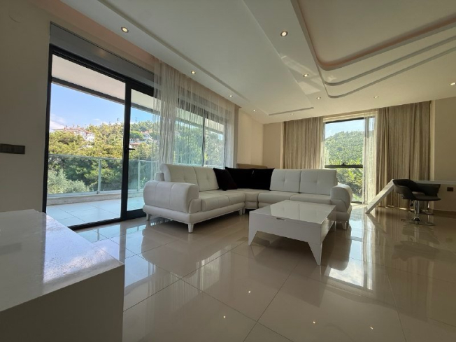 Buy a Furnished 2+1 Apartment with Panoramic Sea Views in Kargicak — 110 m²