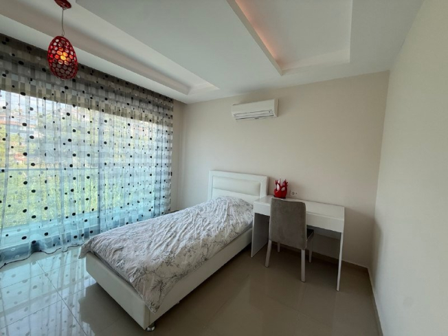 Buy a Furnished 2+1 Apartment with Panoramic Sea Views in Kargicak — 110 m²