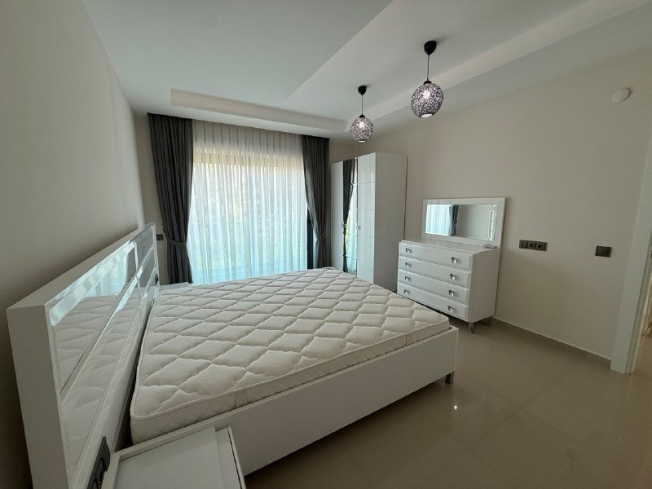 Buy a Furnished 2+1 Apartment with Panoramic Sea Views in Kargicak — 110 m²