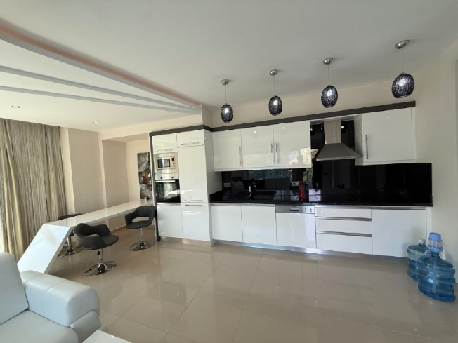 Buy a Furnished 2+1 Apartment with Panoramic Sea Views in Kargicak — 110 m²