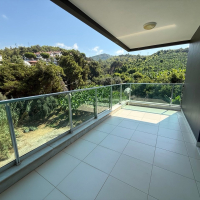 Buy a Furnished 2+1 Apartment with Panoramic Sea Views in Kargicak — 110 m²