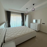 Buy a Furnished 2+1 Apartment with Panoramic Sea Views in Kargicak — 110 m²