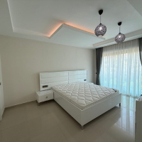 Buy a Furnished 2+1 Apartment with Panoramic Sea Views in Kargicak — 110 m²
